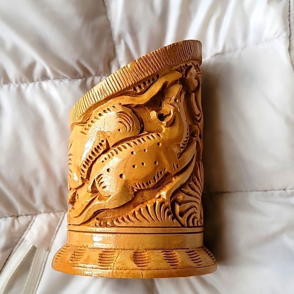 Wood-carved pen holder from India
